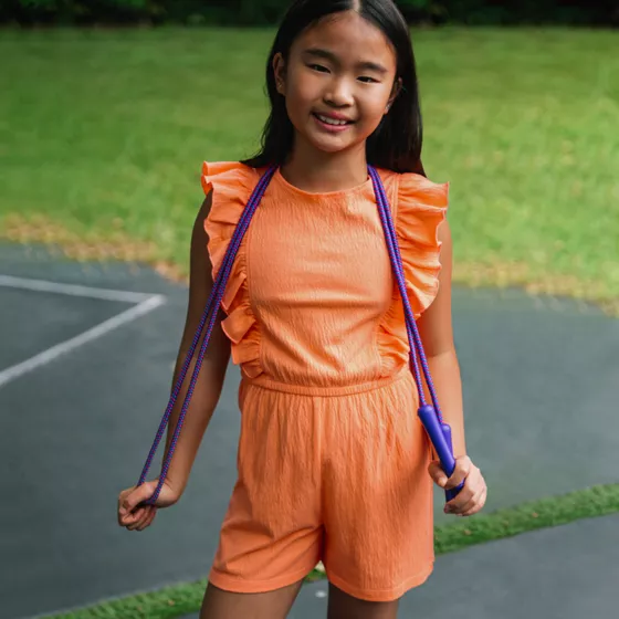 Girls Sleeveless Ruffle Knit Romper - primary