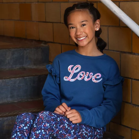 Girls Long Sleeve Ruffle Sweatshirt - primary